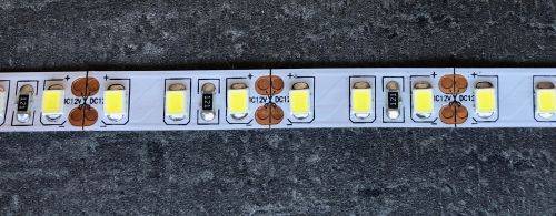 Лед стрічка Skarlat 12В 2835-120 14Вт 2650Лм LED LV 3000K IP44